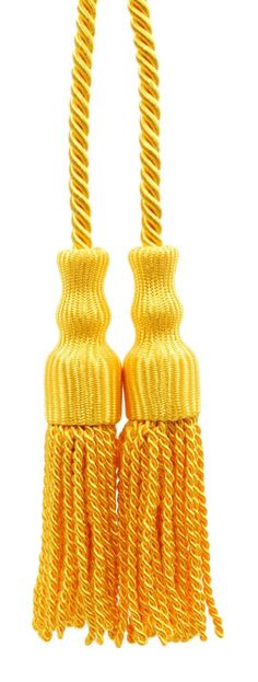 two yellow tassels hanging from a hook