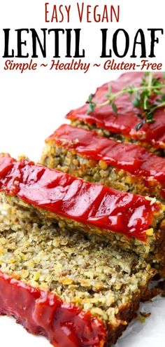 two slices of meatloaf with ketchup on top and the text overlay says easy vegan lentil loaf