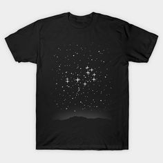 a black t - shirt with stars in the sky