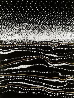 an abstract painting with white dots on black and gold lines, in the middle of water