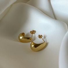 Introducing our basic yet stylish Solid Silver and Gold Filled Drop-Dome Stud Earrings. These earrings are a versatile addition to your jewelry collection, offering a touch of elegance to any outfit. Crafted with care, they feature a simple drop-dome design that adds a subtle charm to your look. The combination of solid silver and gold-filled accents ensures durability and a timeless appeal. Details: Material: Solid .925 Sterling Silver & Gold Filled  Sold in pairs Perfect for both everyday wear Minimalist Hypoallergenic Gold Teardrop Earrings, Gold Plated Drop Teardrop Earring, Gold-plated Tarnish-resistant Teardrop Earrings, Gold-plated Hypoallergenic Teardrop Earrings, Silver Dome Earrings, Silver Drop Earrings, Gold Drop Earrings, Shiny Silver, Silver Hoops