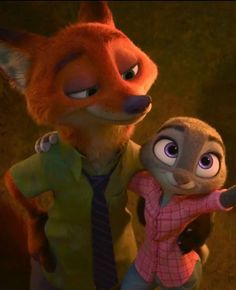 the fox and the hound are standing next to each other