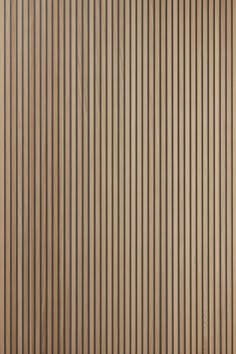 a brown wall with vertical lines on it