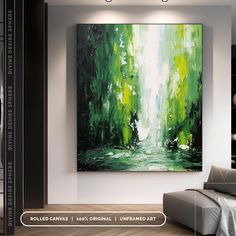 a large painting hanging on the wall in a living room