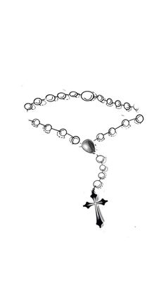 a black and white photo of a rosary with a cross hanging from the middle chain