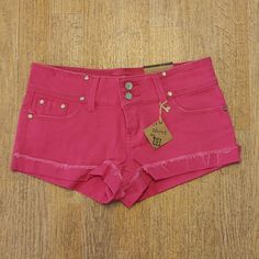 Almost Famous Pink Jean Shorts Front Pockets And Back Pockets Belt Loops Double Button And Zipper Closure Short Zipper Frayed Cuffs Made Of 97% Cotton 3% Spandex Junior Sizes 5, 9, 13. Brand New Hot Pink Jean Shorts, Pink Summer Bottoms With Button Closure, Trendy Pink Bottoms With Button Closure, Pink Buttoned Summer Bottoms, Pink Summer Bottoms With Buttons, Trendy Shorts With Button Closure, Pink Summer Pants With Button Closure, High Waist Pink Bottoms With Button Closure, High-waist Pink Bottoms With Button Closure