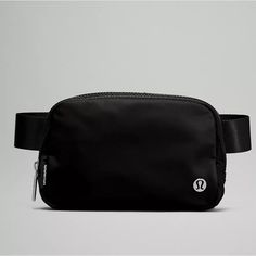 Brand New, Still In Plastic Blk Lululemon Everywhere Belt Bag. Great For On The Go Travel. Can Be Use Across The Waist Or As A Crossbody Bag. Exterior Zippered Pocket To Secure Your Valuables. Interior Pockets Hold The Essentials. Bag Dimensions: 19cm X 5.5cm X 13cm (7.5" X 2" X 5") Volume: 1l Strap Length When Fully Extended: 16cm (41.7”) Questions? Leave A Comment Below! Lululemon Bags, Lululemon Everywhere Belt Bag, Everywhere Belt Bag, Pocket Storage, Festival Bag, Black Crossbody, Metallic Logo, Bag Straps, Black Belt