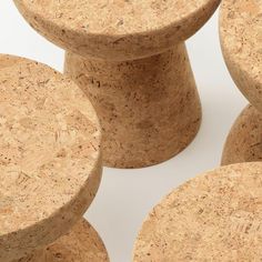 four cork stools stacked on top of each other