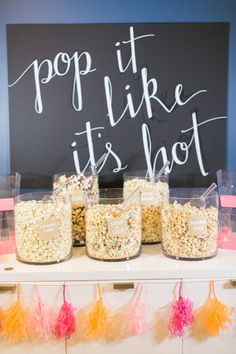 the popcorn bar is ready to be filled with goodies for someone's birthday