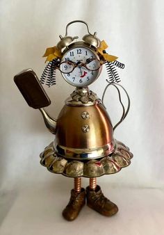 a clock that is sitting on top of a bell