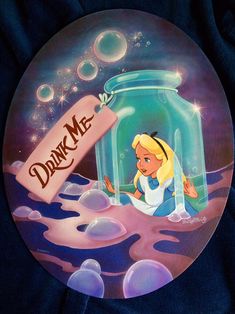 there is a plate with the image of princess aurora in a glass jar on it