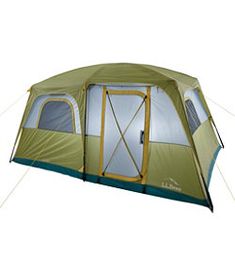 a green and blue tent with the door open on it's side, sitting in front of a white background