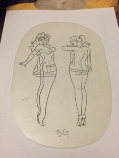 a drawing of two women standing next to each other on top of a paper sheet