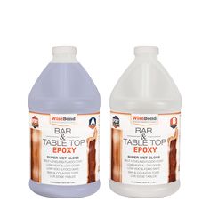 two bottles of bar and table top epoxy sitting side by side on a white background