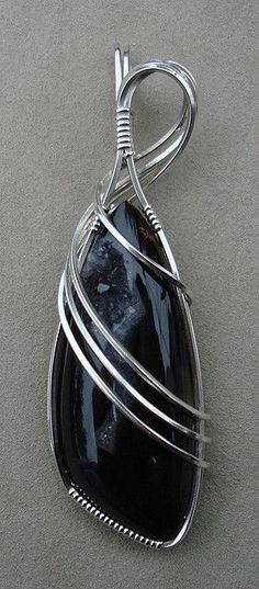 Woodward Ranch Agate Wire Wrap.  Elegant wrap where stone is background to featured wrap. Wire Jewellery, Wire Pendant