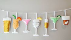 there are many different types of drinks hanging on the line