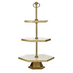 three tiered gold and white cake stand