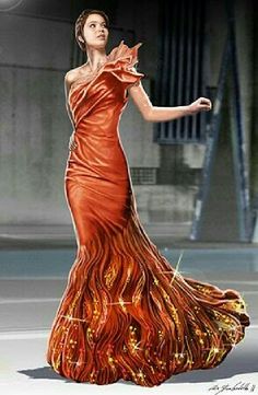 a woman in an orange dress is dancing