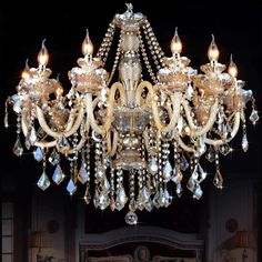 a fancy chandelier hanging from the ceiling