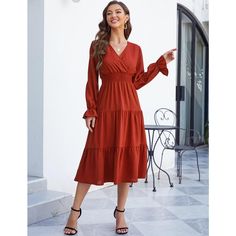 Design Feature: The 2024 smocked waist maxi dress makes you look more noticeable. The graceful casual flowy ruffle dress for women design with pull on closure, wrap v-neck, smocking elastic high waist, long lantern sleeves, tiered swing dress, a line pleated flowy hem. A-line and high waist design is easy to show your sexy curve, and the flare tiered swing skirt making you comfortable all the day, can perfectly express your personality and chic. Also can be wear as a maternity dress. Brown V-neck Solid Color Dress, Brown V-neck Solid Dress, Brown V-neck Dress, Brown V-neck Solid Color Maxi Dress, Elegant Solid Orange Dress, Elegant Orange Solid Color Dress, Chic Orange V-neck Midi Dress, Fitted Orange Maxi Dress For Fall, Spring Orange Midi Dress