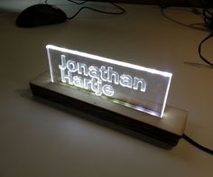 a light up sign that says jonathan harte