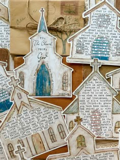 paper cutouts with words and pictures on them are arranged in the shape of houses