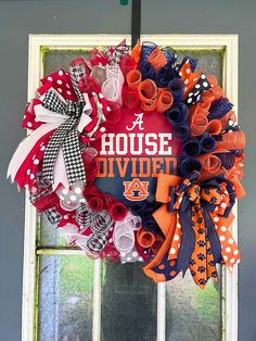 a house divided wreath hanging on the front door