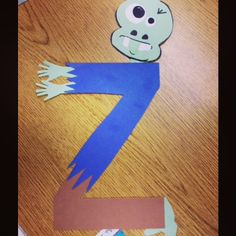 the letter z is made out of paper and cut into shapes