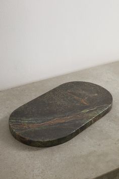 a marble plate sitting on top of a table