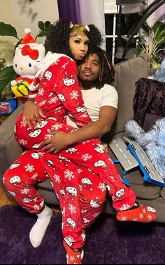 Matching Christmas Pajamas Onesies, Matching Halloween Pajamas For Couples, Cute Onesies For Couples, Matching Pj Sets For Couples, Matching Pjs Christmas Couples, Couples In Matching Pajamas, Hello Kitty Pajamas Couple, Matching Pajamas Black Couples, Matching Thanksgiving Outfits Couples