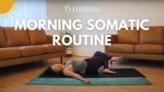 a woman laying on top of a yoga mat in front of a brown couch with the words morning somatic routine