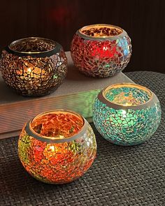 PRICES MAY VARY. Mosaic Candle Holder: Includes 4pcs cracked glass candle holders in 4 colors: amber, yellow, red, and blue. 100% handmade with traditional crafting techniques, creates a delicate and natural ice crack texture candle holders Tealight Candle Holders: Height 2.3”, bottom diameter 2”, opening diameter 2.2”. Suitable for standard tea lights, votive candles, and LED lights within 2 inches diameter Votive Candle Holder: Made of durable thick glass, which ensures the holder’s sturdiness Diwali Candle Holders, Thanksgiving Candle, Mosaic Candle Holders, Deep Autumn Color Palette, Diwali Candles, Round Candle Holder, Bohemian Room Decor, Mosaic Candle, Crafting Techniques