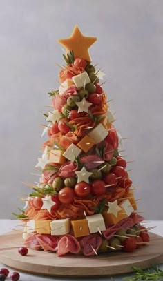 a christmas tree made out of cheese and meats