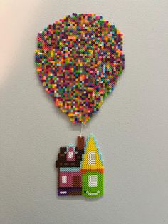 a lego hot air balloon hanging on the wall