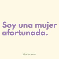 the words say soy una mujer afortunada in purple on a white background