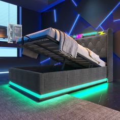 a bed with a lit up mattress underneath it