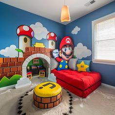 this is a bedroom with mario bros theme on the wall