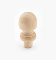 a wooden knob on a white background