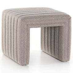 an upholstered stool with four rows of seats on the bottom and one row at the top