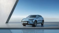 the new porsche cayen suv is shown in front of an abstract background