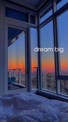 an image of a bedroom with the words dream big in front of it's windows