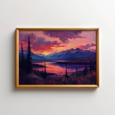 a painting hanging on the wall next to a white wall with a gold framed frame