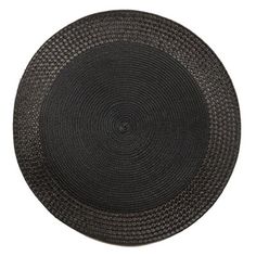 a round black placemat on a white background