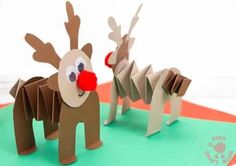 two paper reindeers with red nose and antlers