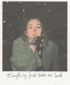 a woman making a funny face in front of confetti falling from her mouth