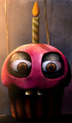 an odd looking object with a candle sticking out of it's face and eyes