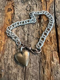 Brass vintage parts restructured to make a love charm, with locket. Very chic for an off the main path look Mixed Metals Jewelry, Vintage Locket, Locket Bracelet, Hippy Gifts, Mixed Metal Jewelry, Funky Jewelry, Love Vintage, Love Charms, Mixed Metals