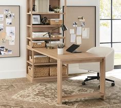 a wooden desk sitting in front of a book shelf