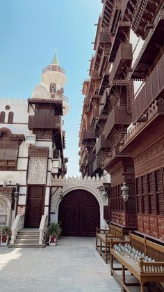 an old building with wooden balconies on the sides