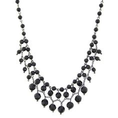 This vintage inspired, jet black beaded, hematite-tone necklace channels pure decadence. Polished hematite tone links are strewn with a graduating pattern of onyx black color beads. Measurements: 16"L x 1"W 2028 Jewelry Collection 2028 Jewelry features more fashion forward design choices comprised of premium components. The collection is enhanced with noticeable statement pieces that respect vintage aesthetics, while integrating them into a more refined fashion jewelry collection that fits with Black Jewelry Necklace Macy's, Luxury Adjustable Black Beaded Jewelry, Affordable Black Beaded Metal Jewelry, Luxury Black Beads Jewelry, Affordable Traditional Black Beaded Jewelry, Gothic Crafts, Channel Jewelry, Refined Fashion, Vintage Bohemian Style